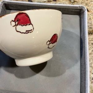 Three Beautiful Santa hat cereal bowls made in Portugal. The main color is bone.